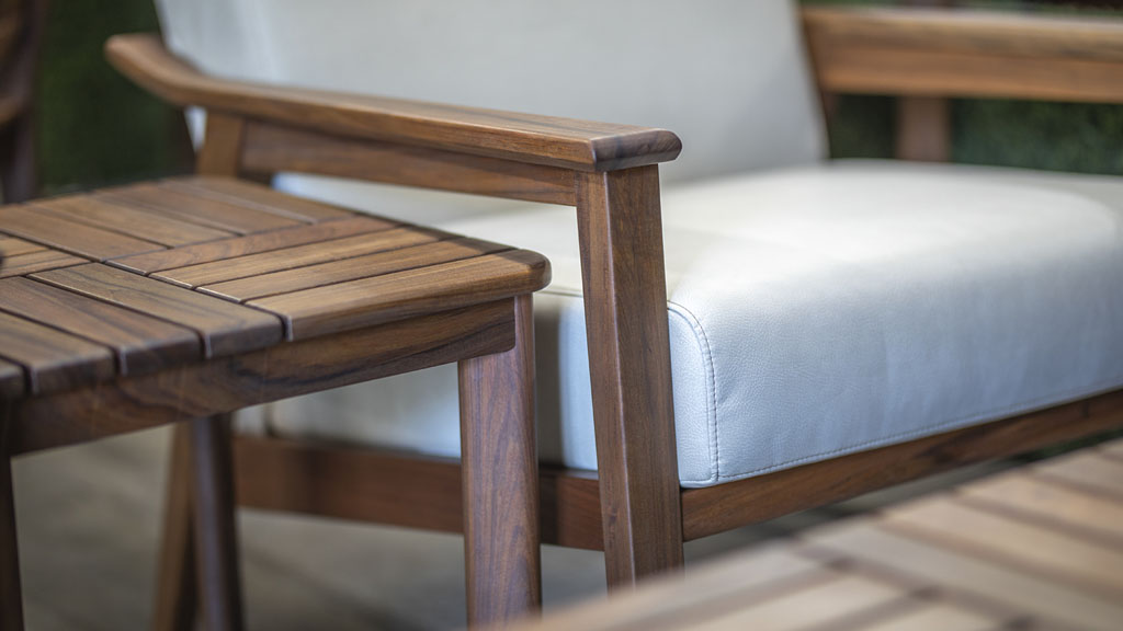 Deep seating luxurious wood leather chair and side table. Wood Furniture Store Champaign IL