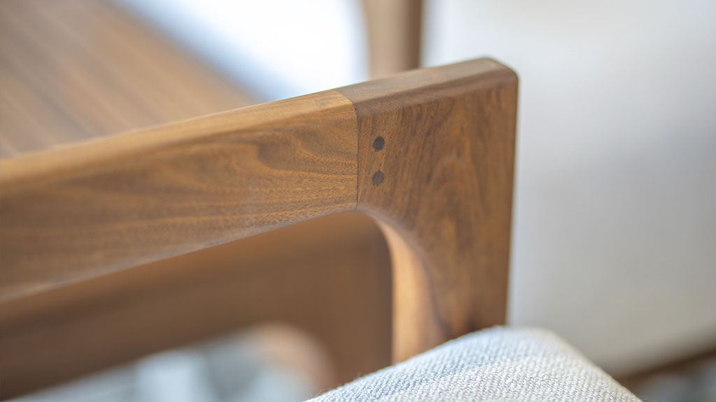 Precisely manufactured solid wood armrest joinery. Wood Furniture Store Champaign IL