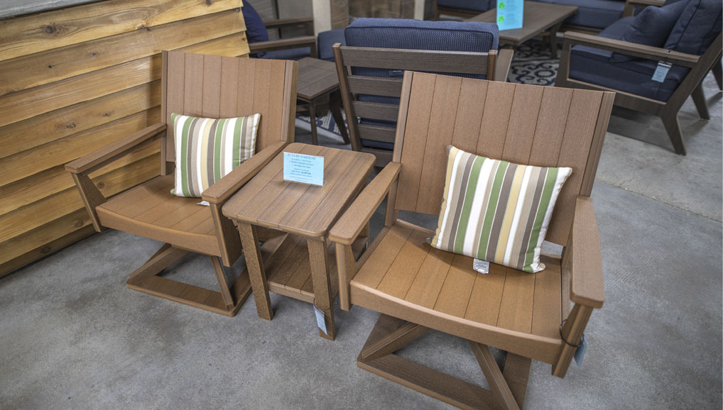 2 large poly chairs and side table with wood texture. champaign-il-store