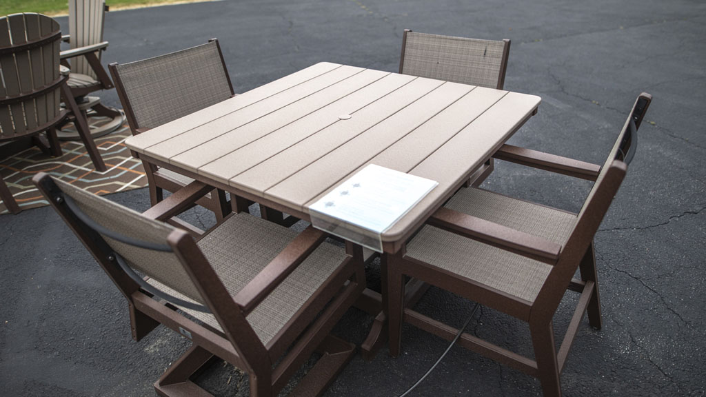 4 person poly dining with sling swivel chairs and square table. champaign-il-store