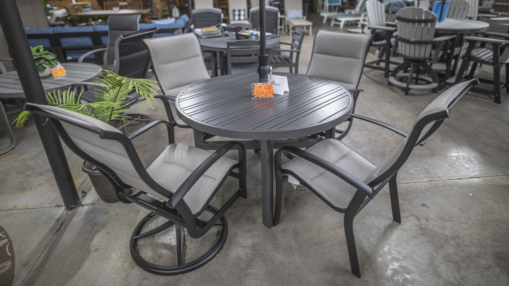 4 person aluminum round table dining set with swivel padded sling chairs. champaign il store