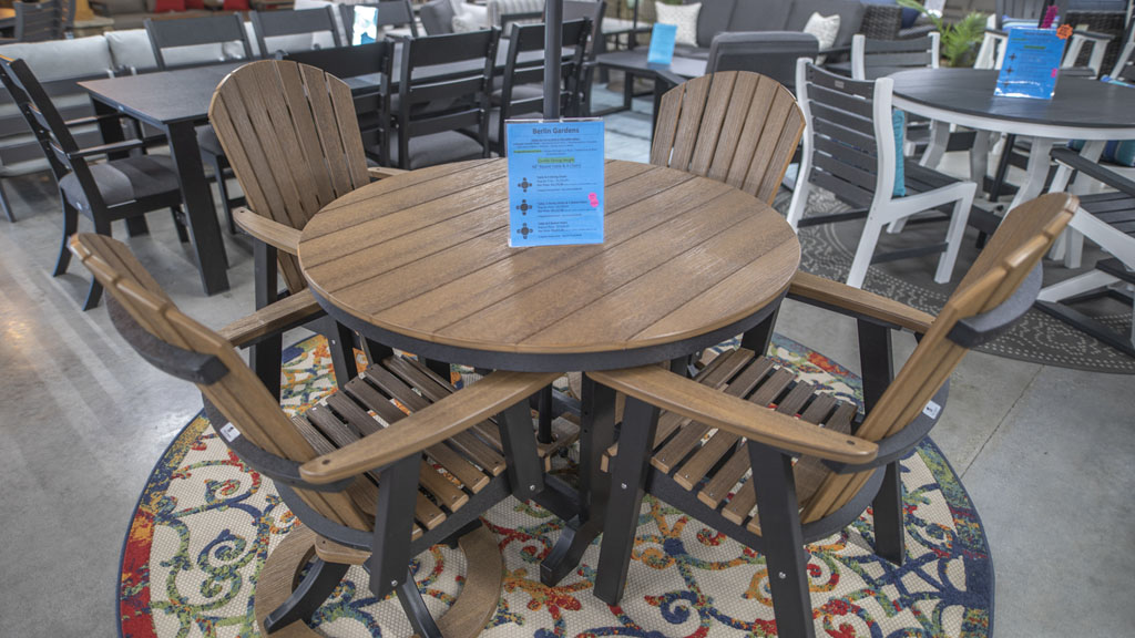 4 person poly dinette with swivel chairs in wood texture. champaign il store