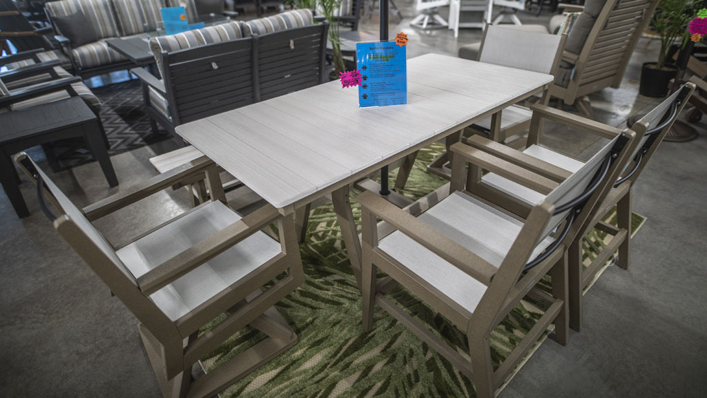 6 person dining set with sling swivel chairs in wood texture. champaign il store