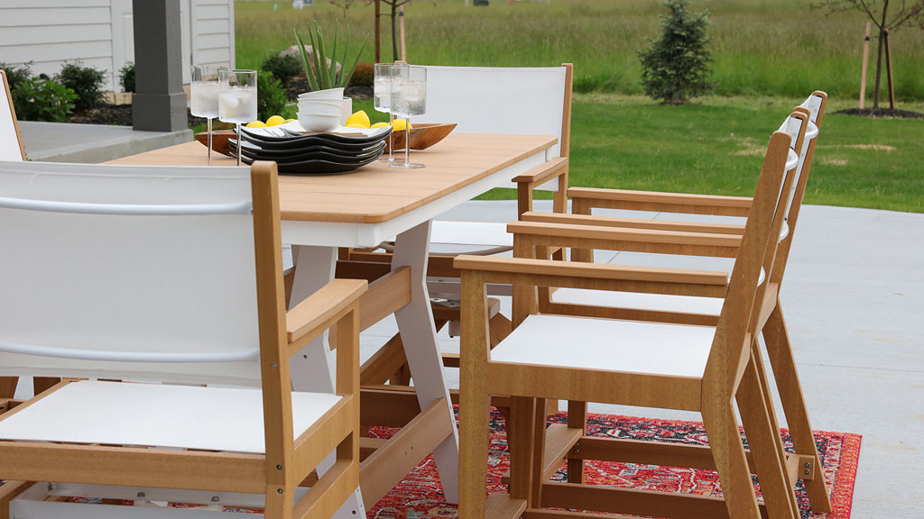 Poly dinette sling chair in wood texture. 