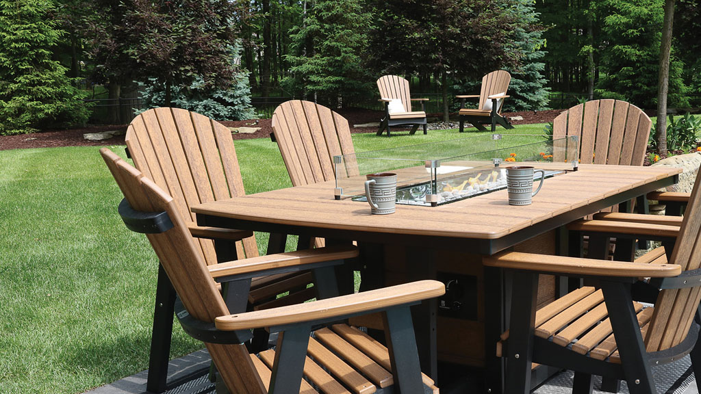 Quality poly dining table with fire insert and chairs in wood texture.